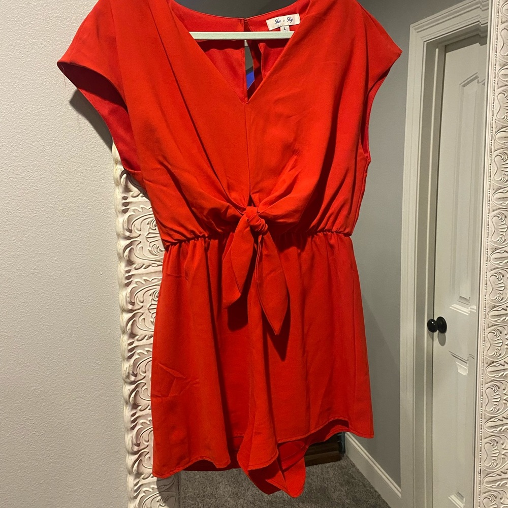 Red romper with open back